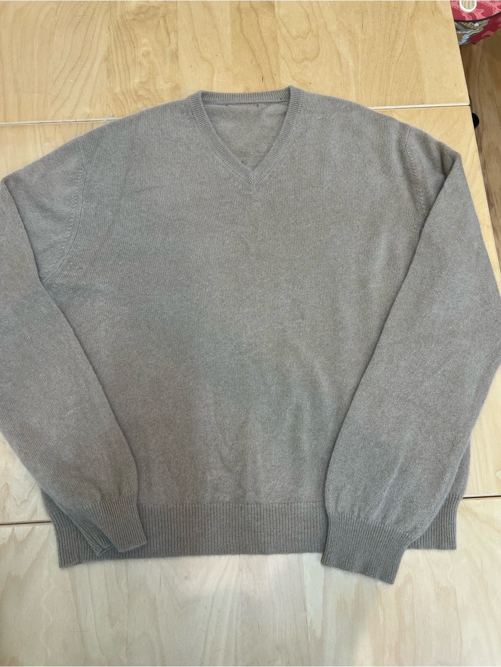 Men's V-Neck Knit Sweater in camel cashmere.
